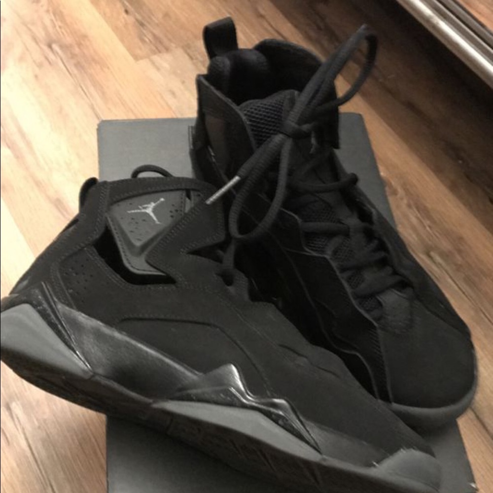 Jordan’s black and gray size 5